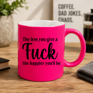 The less you give a fuck the happier you'll be Mug – Neon Pink